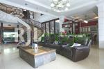 Area living room dengan sofa set minimalis